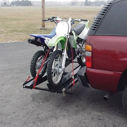 VersaHaul Double Motorcycle Carrier loaded with 2 motorcycles on back of SUV