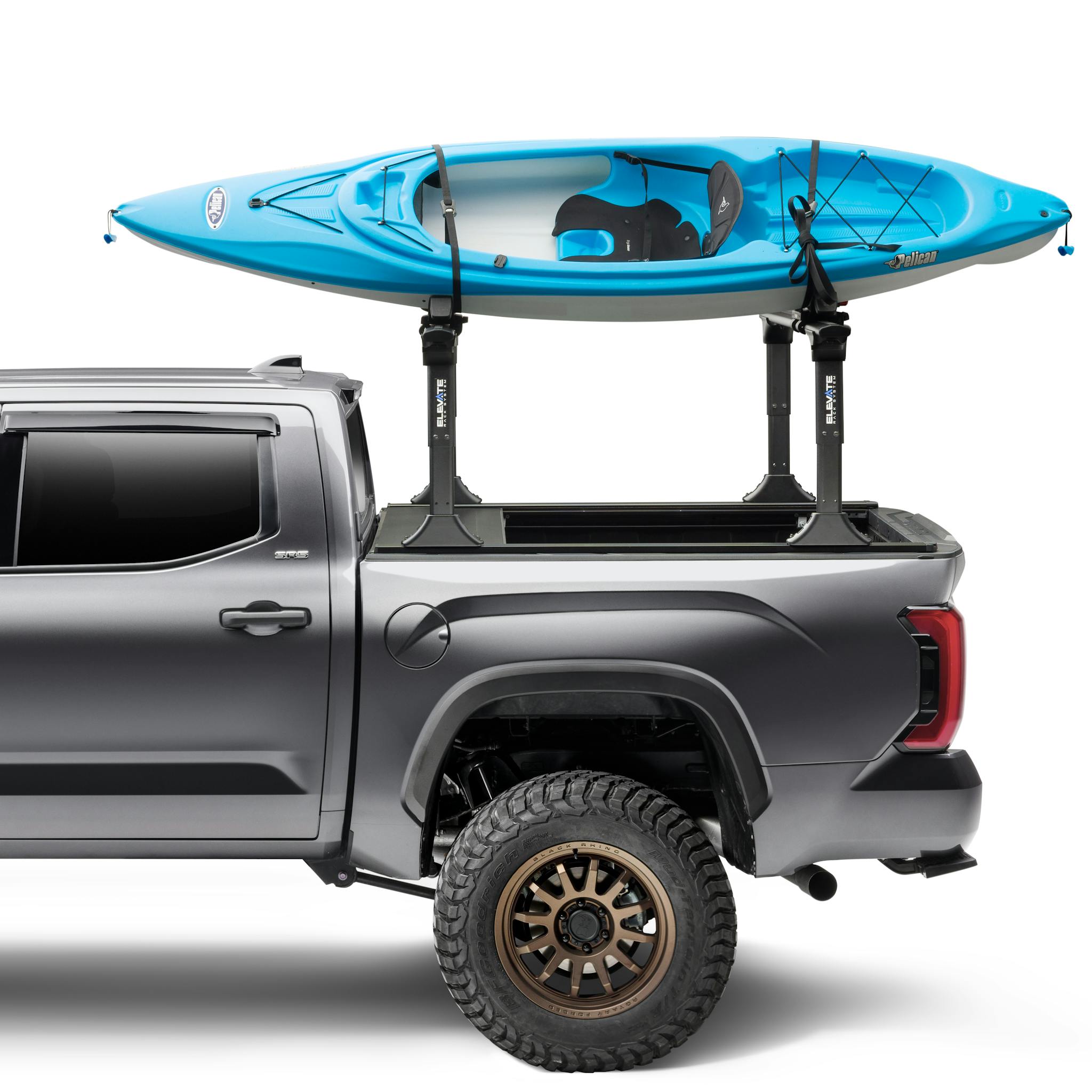 RetraxOne XR Tonneau Cover and TruXedo Elevate Truck Rack Side View with Kayak