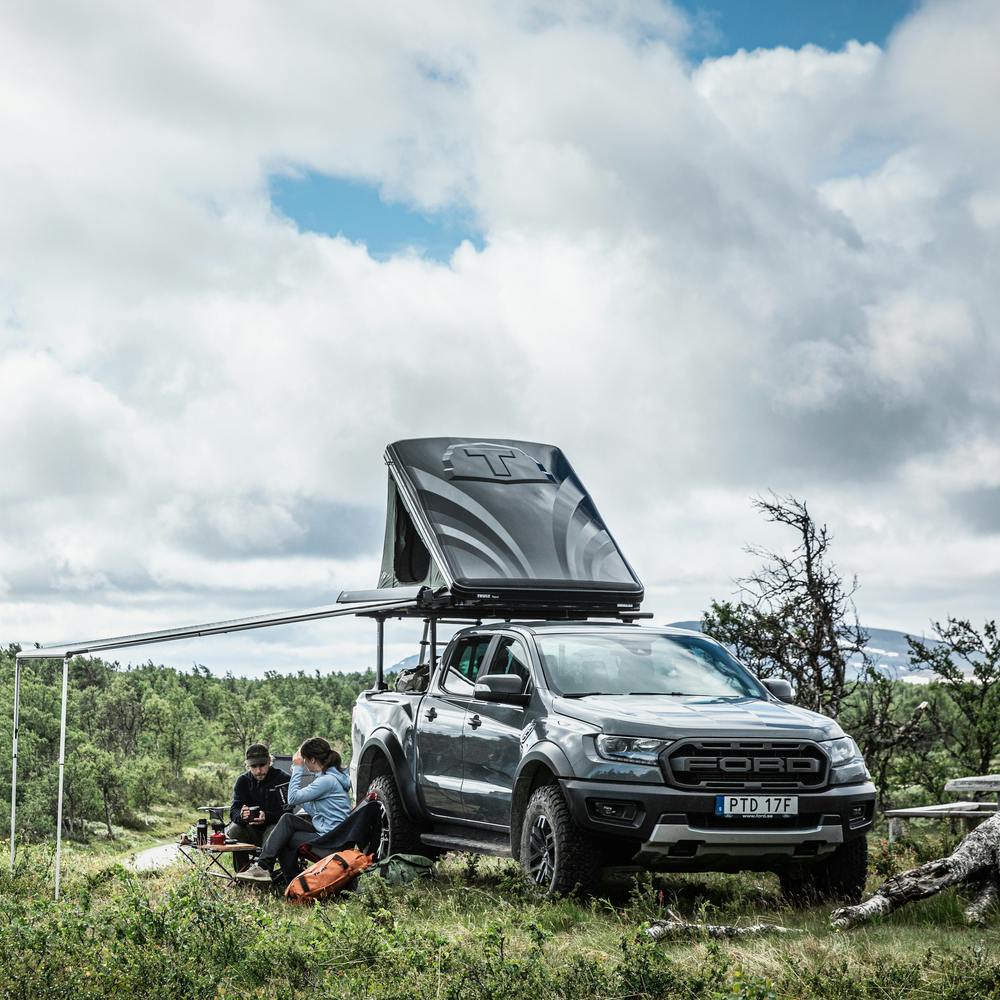 Thule Basin Wedge Rooftop Tent Front View in Field camping