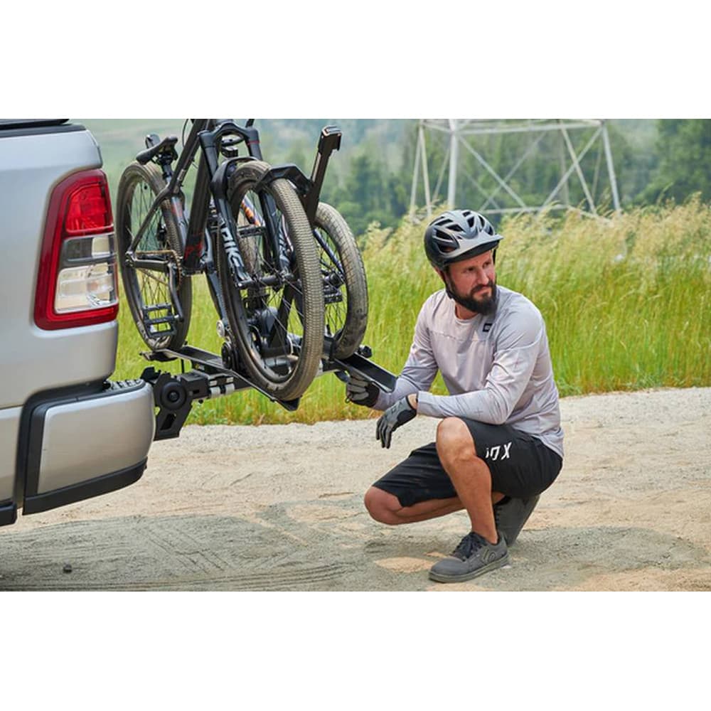 MHS UNO 2 bike with kneeling man