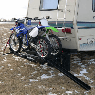 VersaHaul Double Motorcycle Carrer with ramp loaded up on back of RV with ramp out
