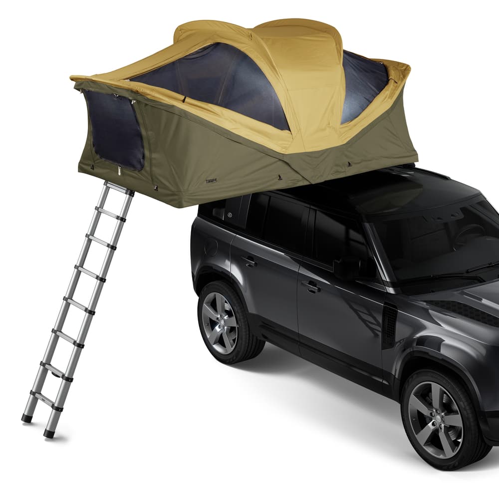 Fennel Tan Medium Thule Approach Rooftop Tent on top of vehicle angled view